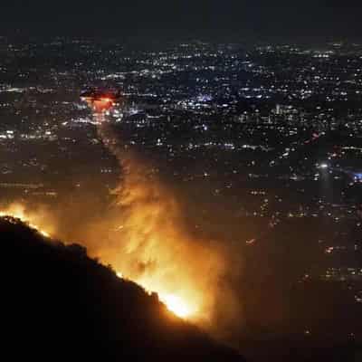 Hollywood Hills burn as LA engulfed by 'the big one'