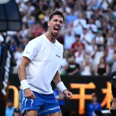 Injured Kokkinakis battles to gritty Open win