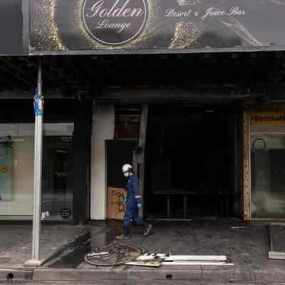 Man fighting for life after inner suburban shop torched