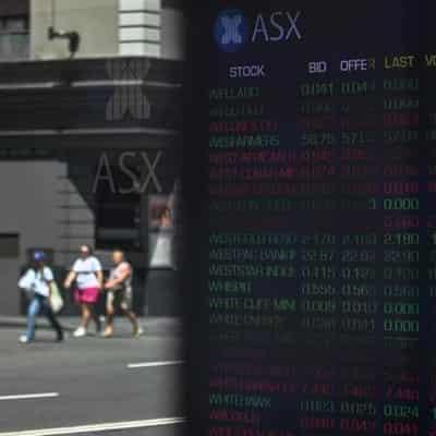 Australian shares slip, but finish week in the green