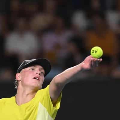 Hewitt knocked out of junior doubles after singles win