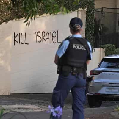 Woman charged after anti-Semitic graffiti attack