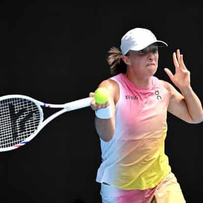 Swiatek continues one-sided procession to Open semis