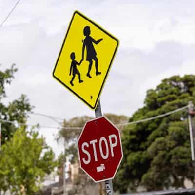 Back to school but more kids escorted over safety fears