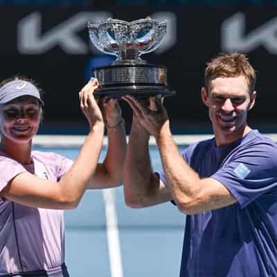 Aussies Peers and Gadecki celebrate mixed doubles title