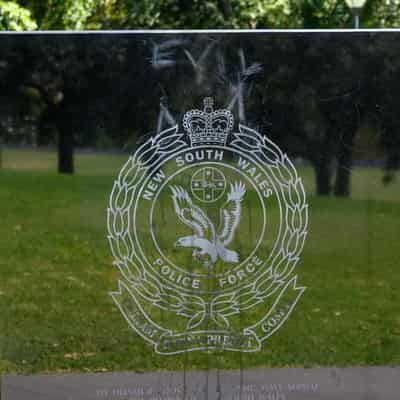 Man charged over vandalism of police tributes memorial