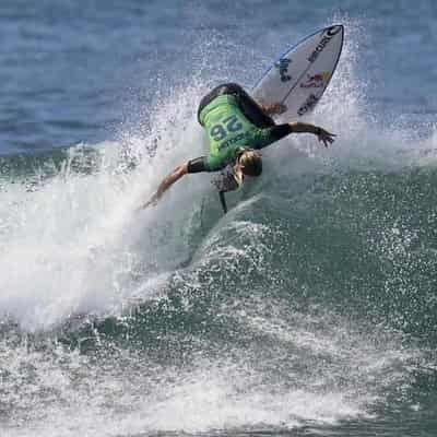 Surfers wait for waves at season-opening Pipe Pro