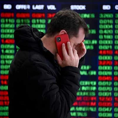 Aussie shares, dollar plunge as Trump starts trade war