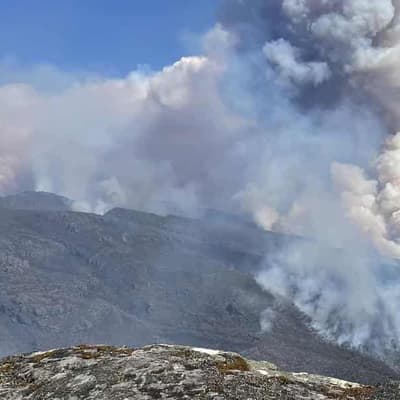 Weather on firefighters' side in race to control blazes