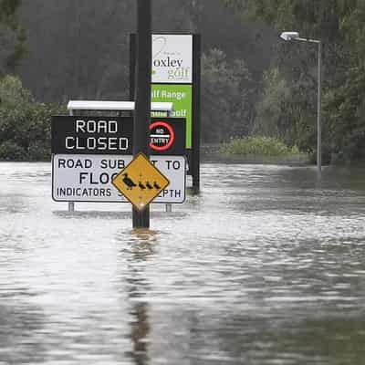 Flood, dam-spill fears put wind up locals after cyclone