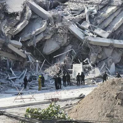 High-rise falls as powerful quake rocks Southeast Asia