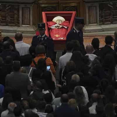 Faithful flock on last day to pay respects to Pope
