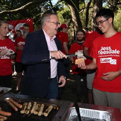 Hammer and tongs: PM urges supporters to 'go hard'