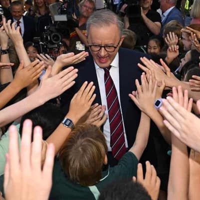 A for Albanese during uproarious school visit