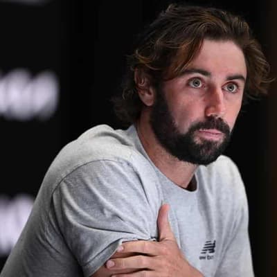 Thompson survives trial by serve to win in Italian Open