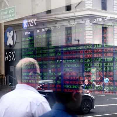 Australian shares edge higher on trade deal talk