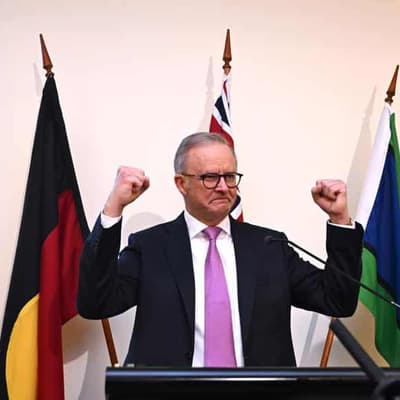 PM rallies troops, urges caucus to focus on Australians