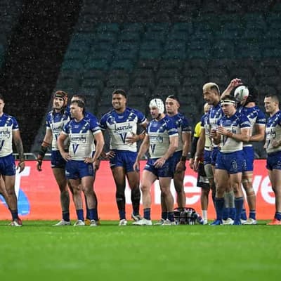 Dolphins rise in the wet to rip through depleted Dogs