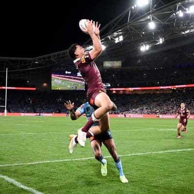 Coates floats high above To'o in Maroons aerial threat