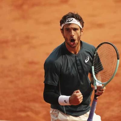 Musetti survives disqualification row to reach semis