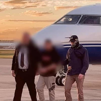 Group of men extradited over alleged extortion attempt