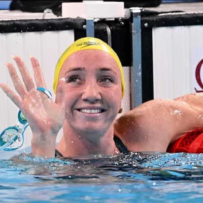 Ace swimmer comes up trumps after dealt bad hands