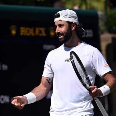 No snail's pace as Tommo breaks new Wimbledon ground