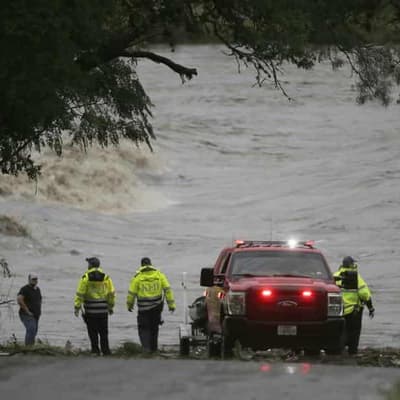 Young campers missing as 24 die in Texas flash flooding