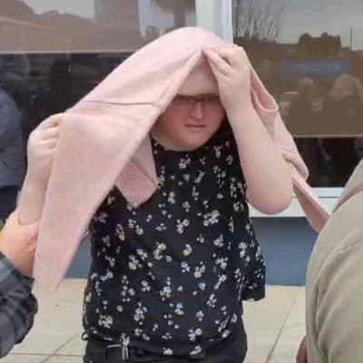 Cloaking tactics: alleged hacker hides face with jumper