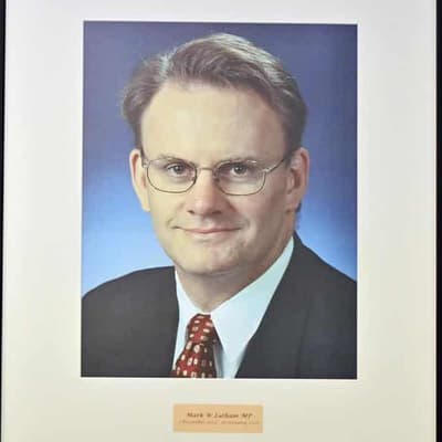 PM slams 'repulsive' Latham as Labor portrait remains