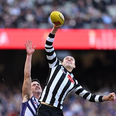 Moore wary of rival tactic as Magpies reset flag push