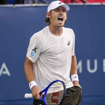 De Minaur through to Washington semis, Medvedev upset