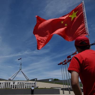 Chinese national charged over 'intelligence gathering'