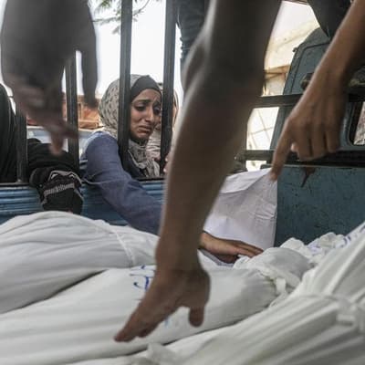 Shortage of burial shrouds as dozens more Gazans die
