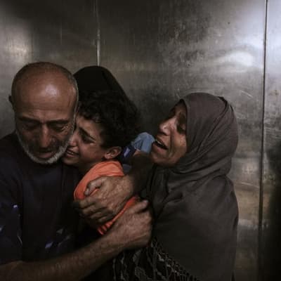 Dozens killed in Gaza as Israel weighs military action