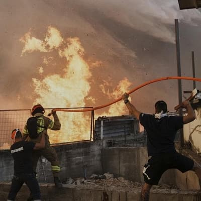 Heatwave, strong winds fan wildfires across Europe