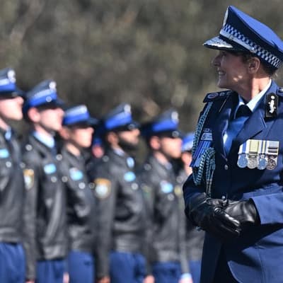 Successor search goes on as recruits farewell top cop