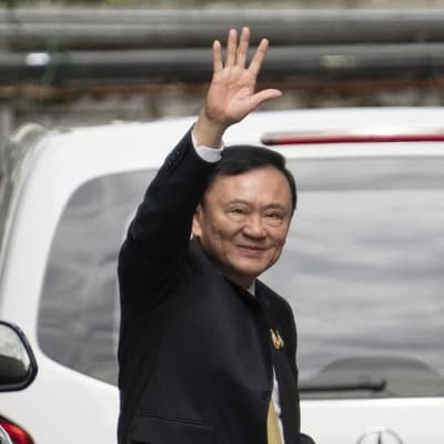 Court clears former Thai PM in royal insult case