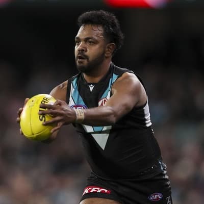 Port Adelaide forward quits as new coach swings axe
