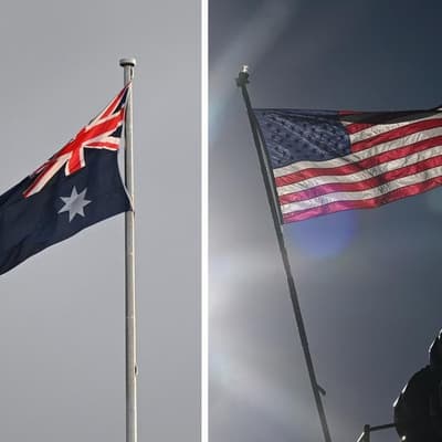 Australian minister comes face-to-face with JD Vance