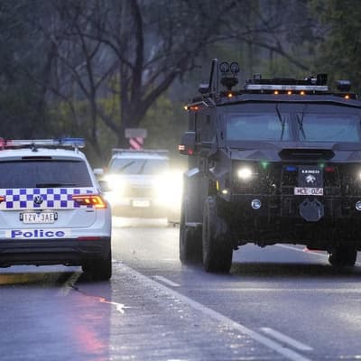 Dangerous terrain hampers search for accused cop killer