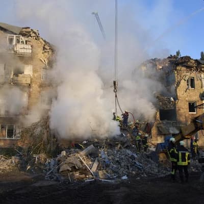 Russian barrage kills 18 in Kyiv, damages EU mission