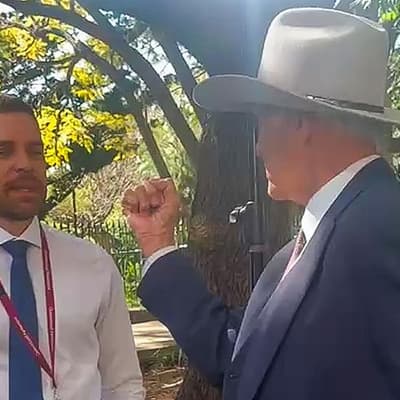 'You're a racist': Bob Katter raises fist at reporter