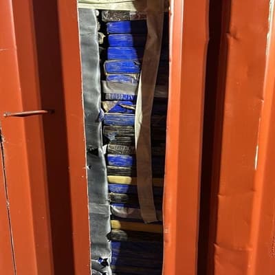 'Corrupt' dockers accused of hiding drugs in false wall