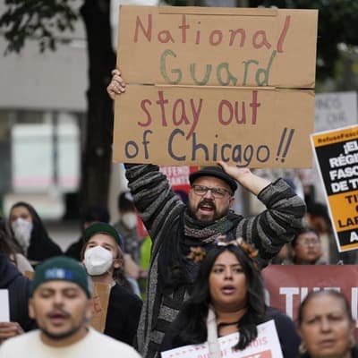 Trump threatens to deport defiant Chicago protesters