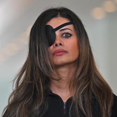 Protest charges dropped against woman 'punched by cop'