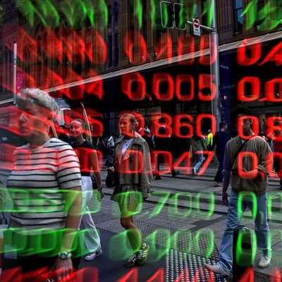 Aussie shares finish higher as banks rally, miners fall