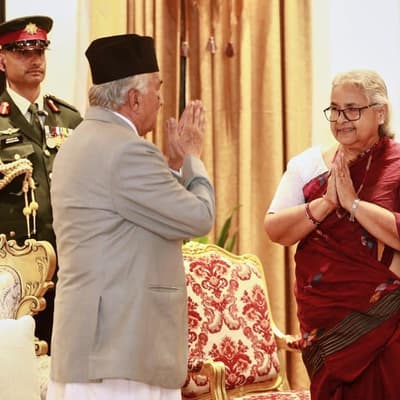 Nepal sets poll date as interim prime minister sworn in