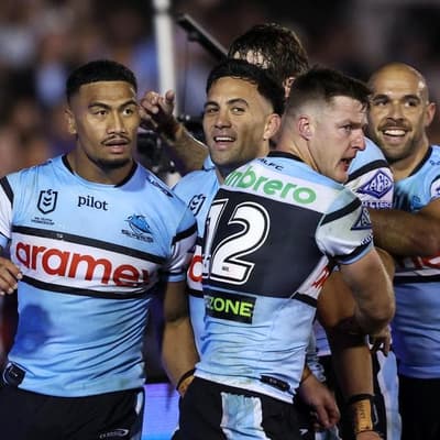 Evolved Sharks hold nerve to eliminate Chooks