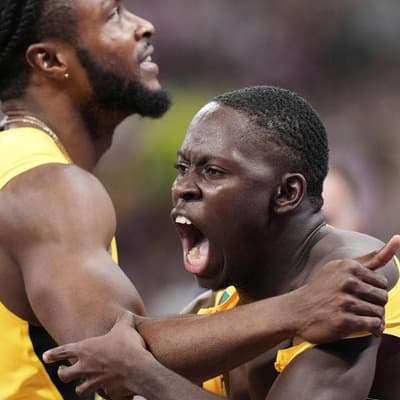 Seville shines brightest in men's 100m boilover